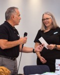 2026-09-18 -01 -Dom presents donation check to Re Threaded